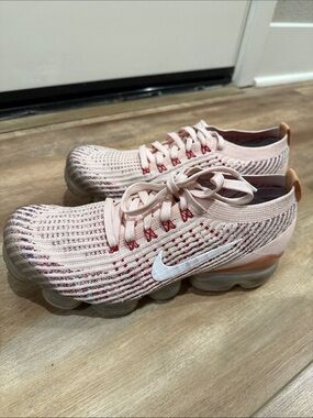 Nike Women’s Light Pink Knit VaporMax Sneakers with White Swoosh